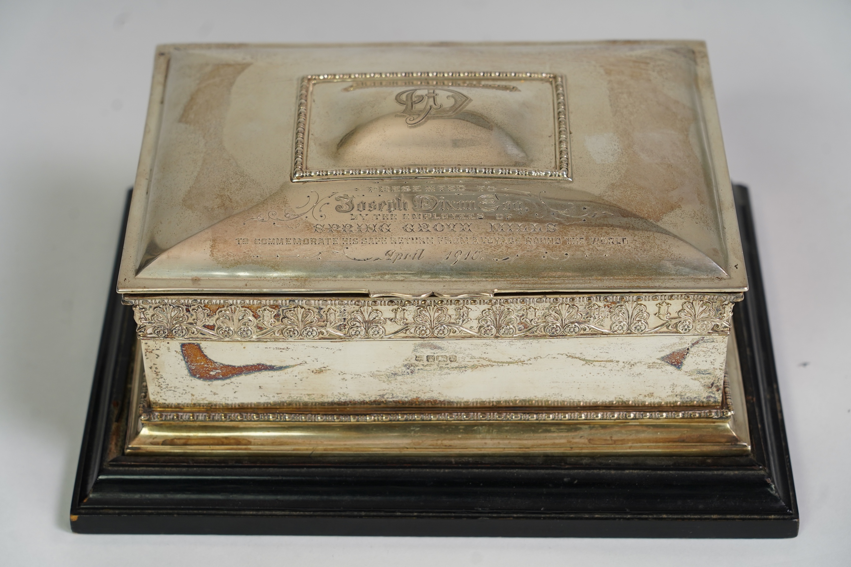 An Edwardian silver presentation cigar box, by Cooper Brothers and Sons